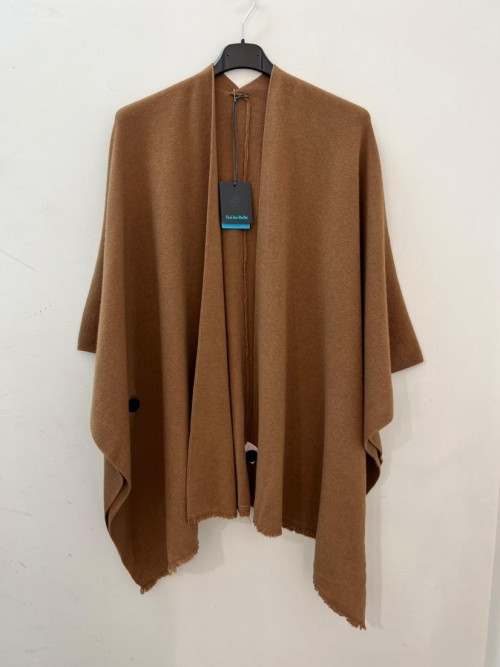 Poncho frangé avec bouton pour fermer la manche