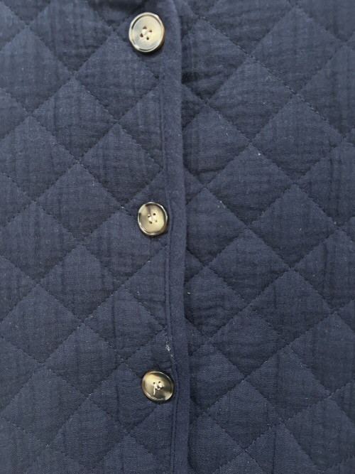 Veste matelassée col rond boutons