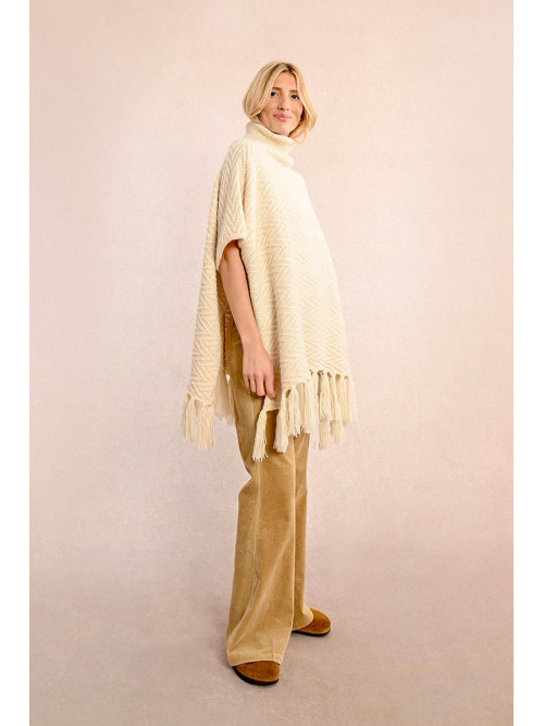 Poncho long frangé col roulé
