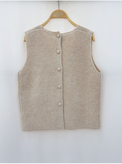 Pull tricot col V sans manches boutonné dos
