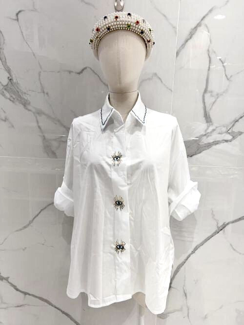 Chemise oversized avec œil brodé et sequins