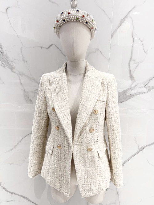 Veste tailleur en tweed et boutons dorés manches longues