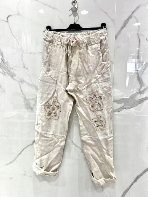 Pantalon en lin avec fleurs brodées et sequins