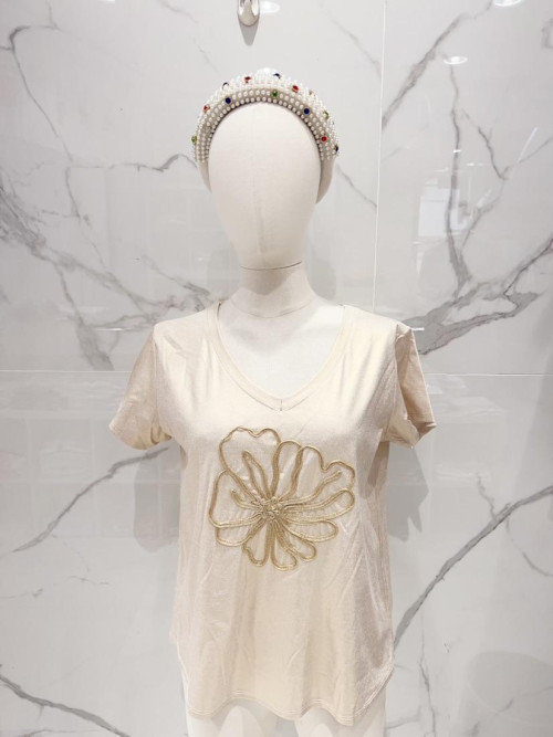 Top col V lurex fleur en ruban devant