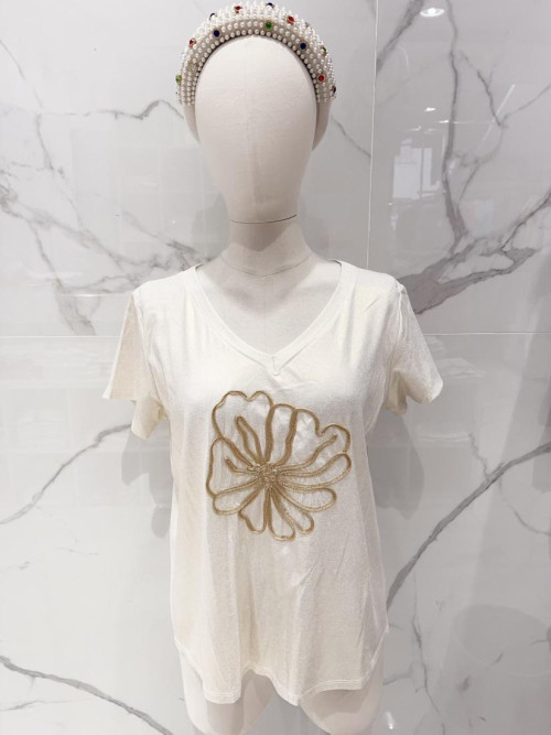 Top col V lurex fleur en ruban devant