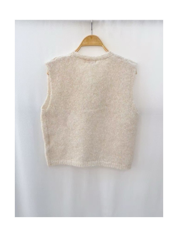 Gilet maille avec 3 boutons bijoux dorés sans manche