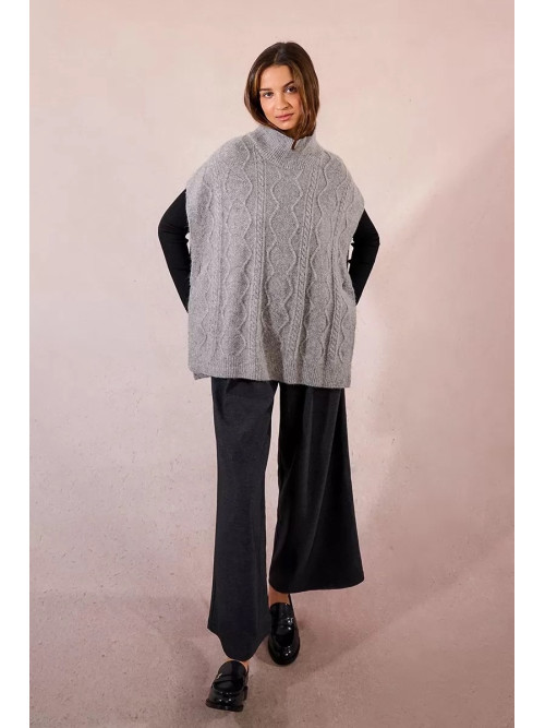 Poncho torsadé col montant