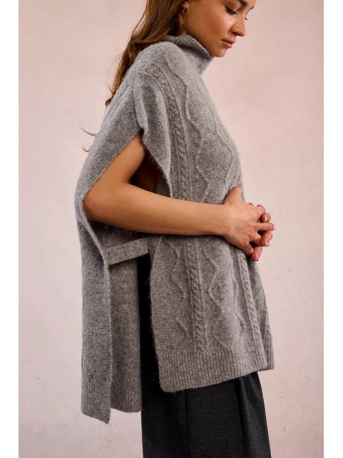 Poncho torsadé col montant
