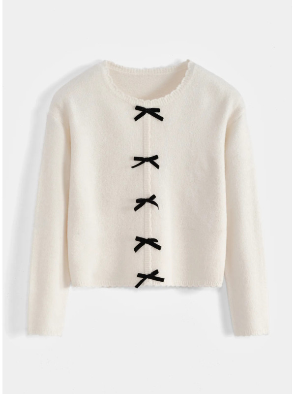 Pull bords festonnés et nœuds velours noirs