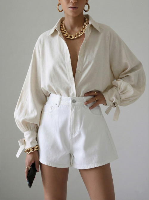 Chemise manches longues nouettes aux poignets