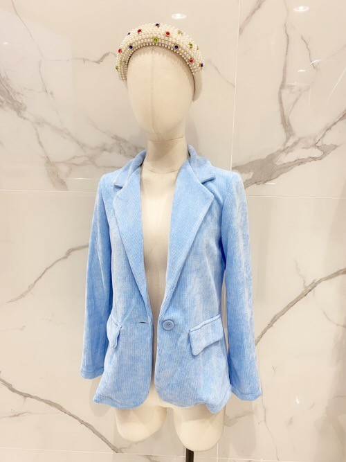 Veste souple en maille velours boutonnée Veste souple en maille velours boutonnée