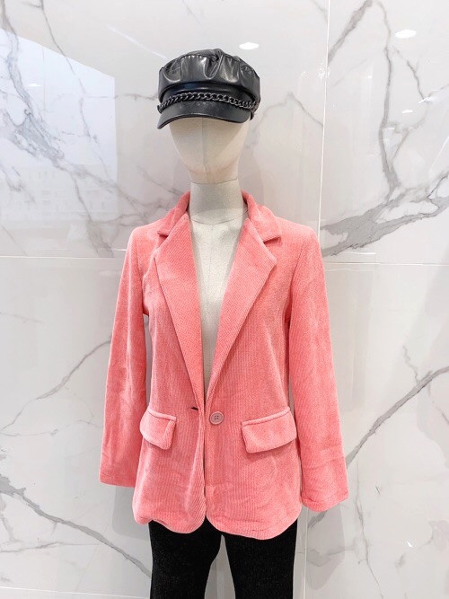 Veste souple en maille velours boutonnée Veste souple en maille velours boutonnée