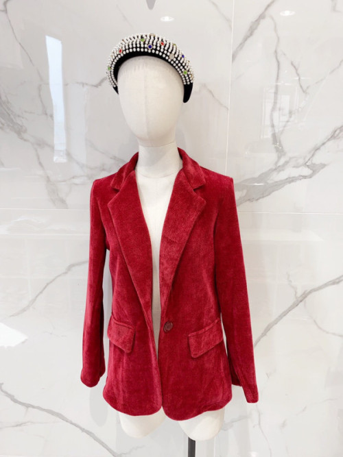Veste souple en maille velours boutonnée Veste souple en maille velours boutonnée